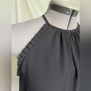 Black Fab’rik sleeveless tank with ruffles and keyhole